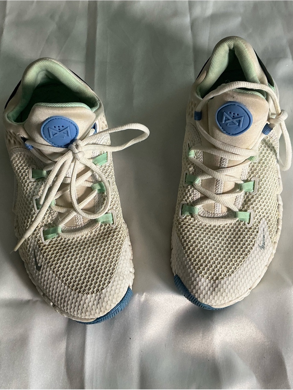 Nike Woman Cream Mesh Sneakers with Blue & Mint Accents